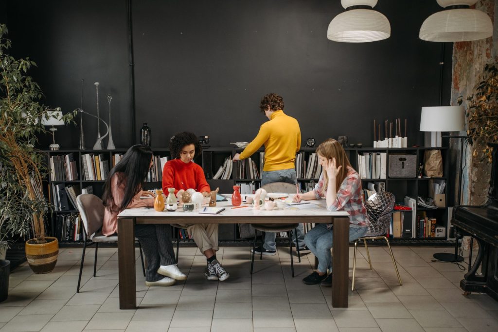 Diverse team of professionals collaborating in a stylish office space.